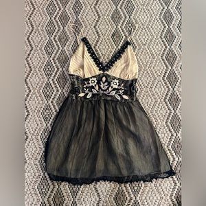 absolutely in love with this embroidered, lacey, tule detailed mini dress/tunic